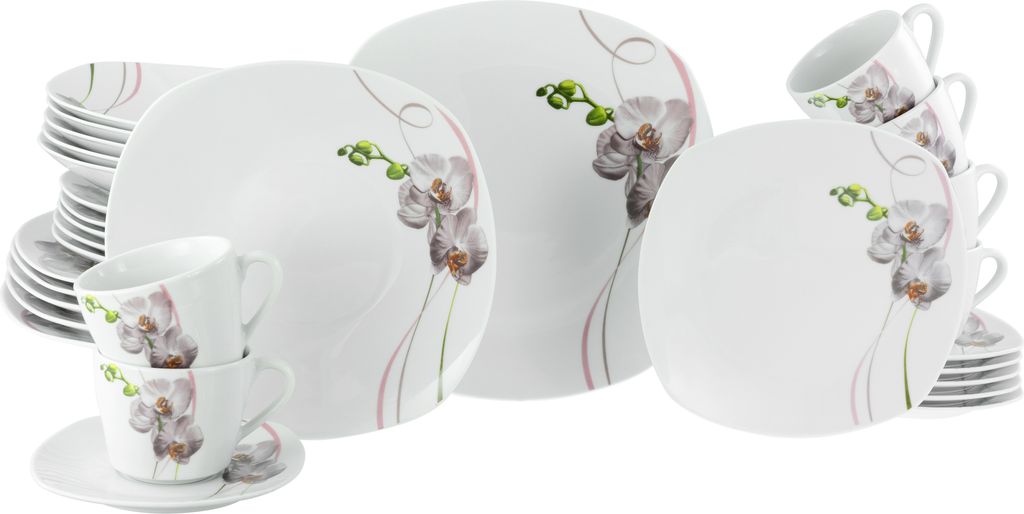 A collection of white porcelain dinnerware with an orchid design, including plates and cups.