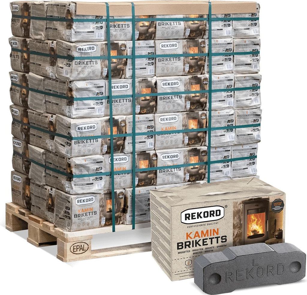 A large pallet of briquette packages and a single box with briquettes in the foreground.