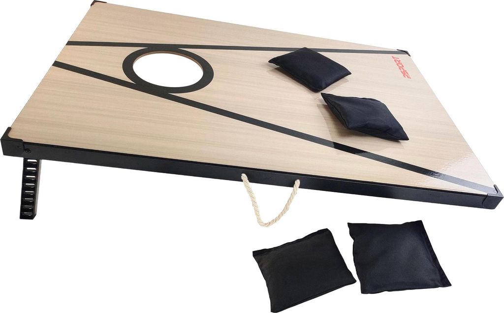 A cornhole board with bean bags on a white background.
