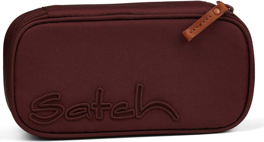 A burgundy pencil case with the brand name "Satch" embossed on the front and a small leather tag attached to the zipper.