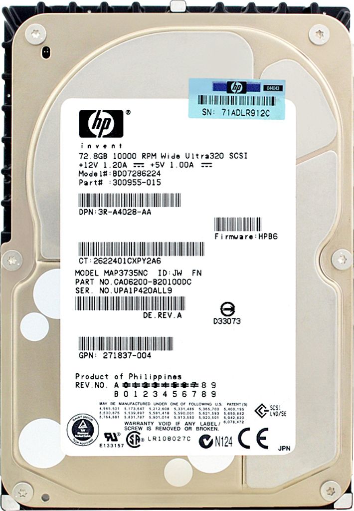 A close-up, top-down view of a hard drive with a label containing product information.