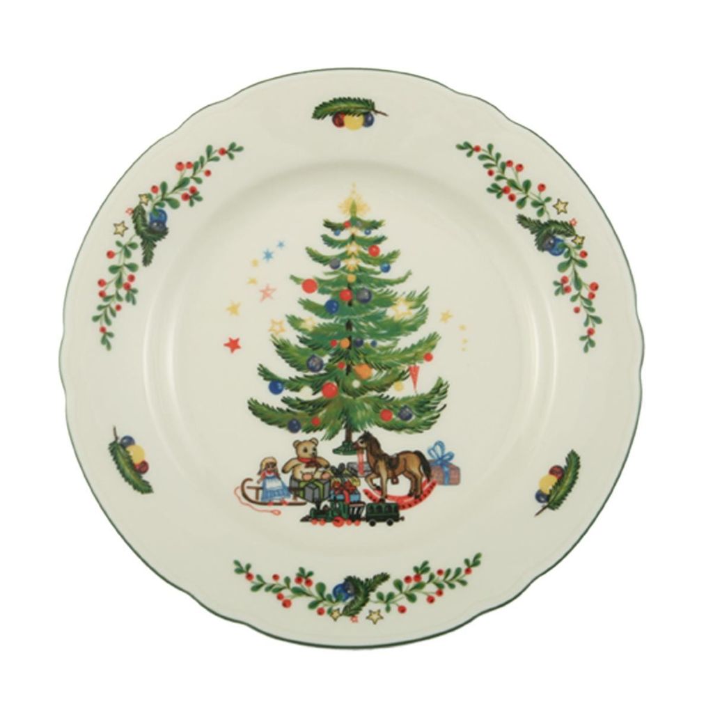A Christmas-themed plate with a decorated tree and toys.