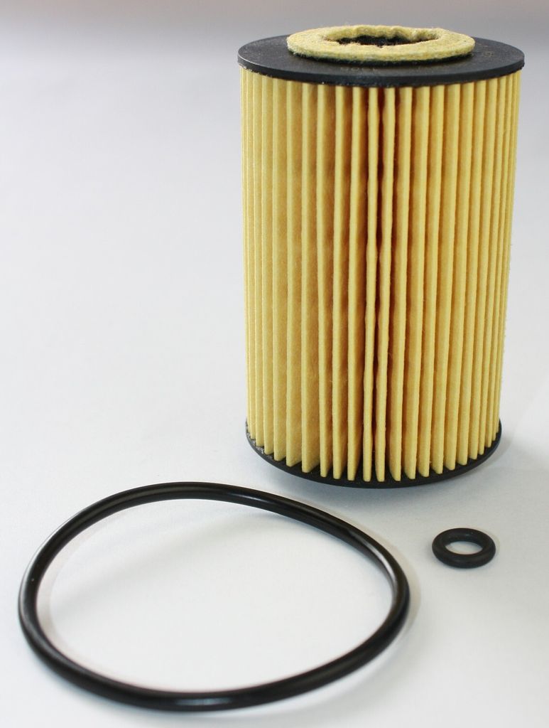 A car oil filter and two O-rings on a white background.