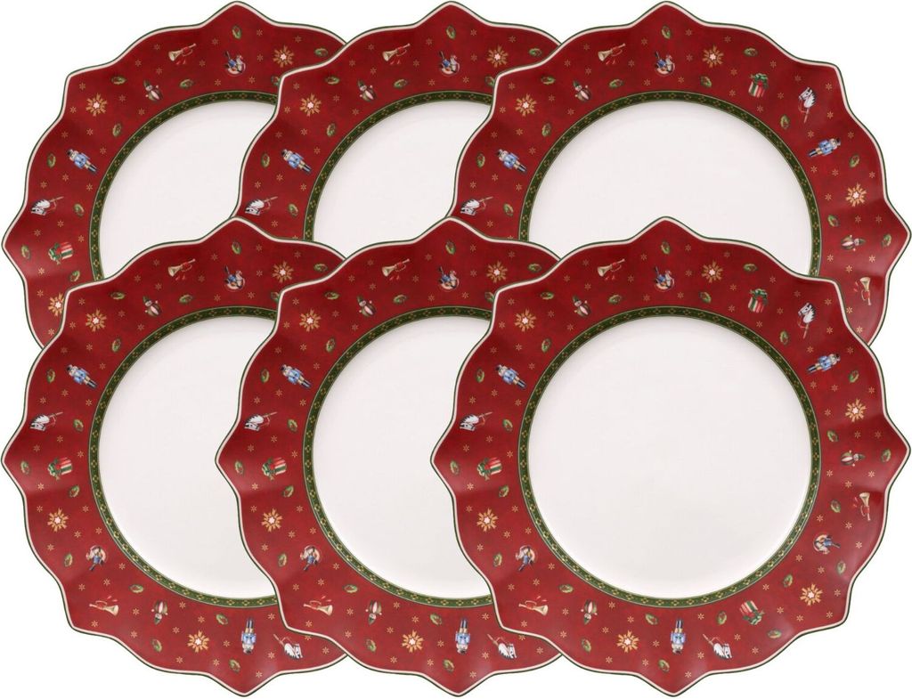 A set of six dinner plates with a red, festive pattern.