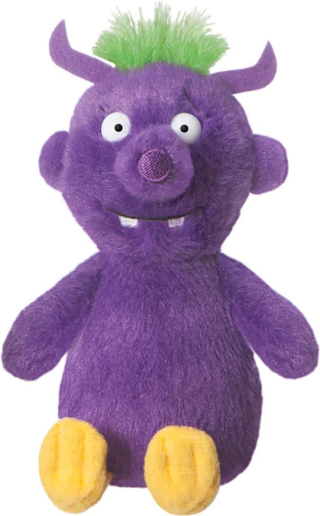 A plush toy monster sitting down.
