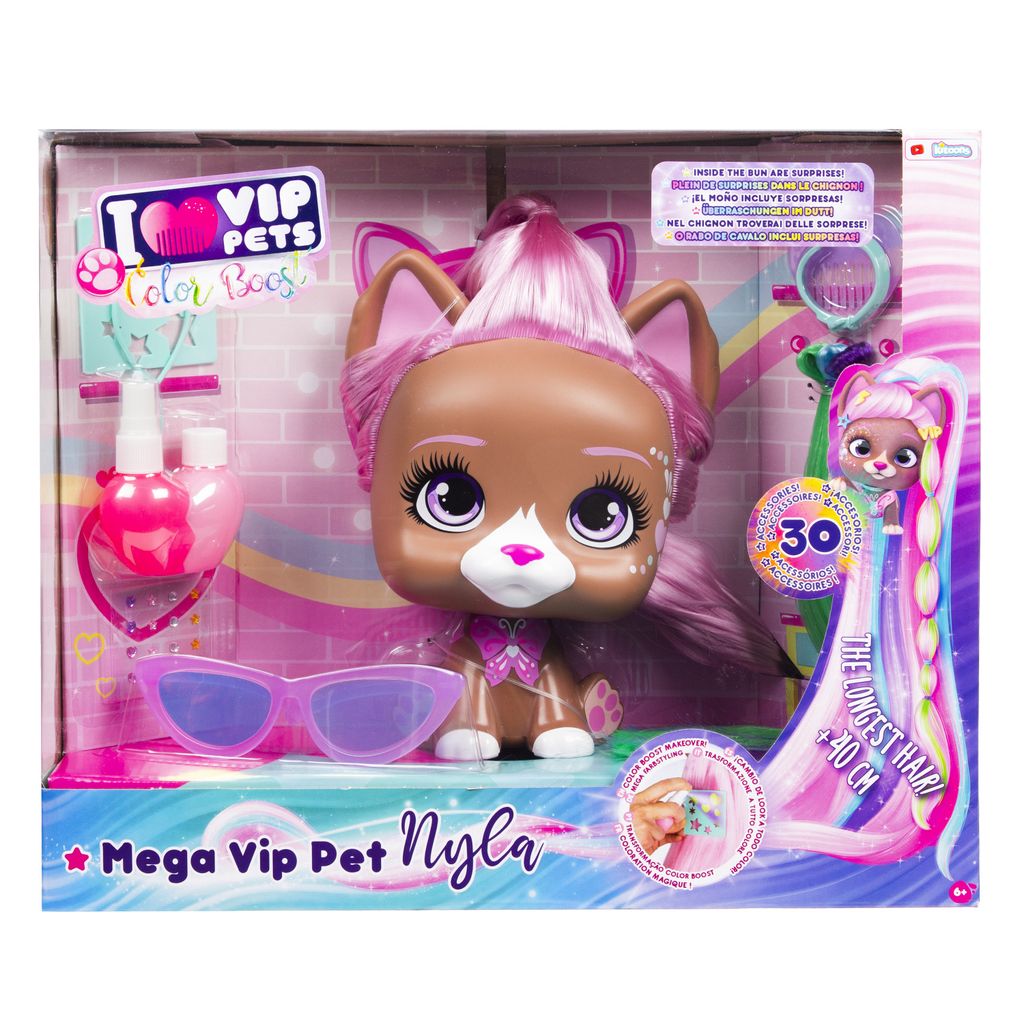 A toy styling head of a dog named Nyla, presented in its retail packaging.