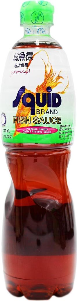 A bottle of Squid Brand Fish Sauce against a white background.