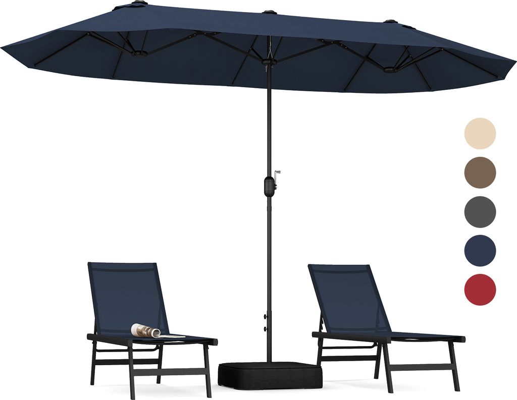A navy blue double patio umbrella with two chairs and a base.