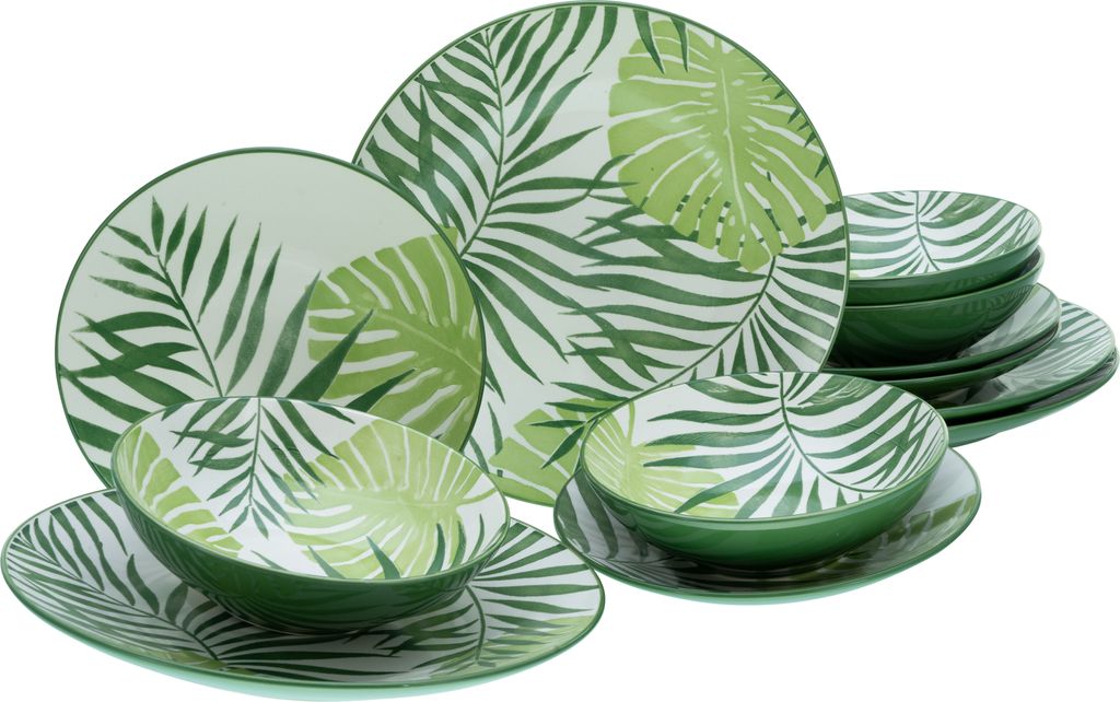 A set of dinnerware with a tropical leaf pattern.