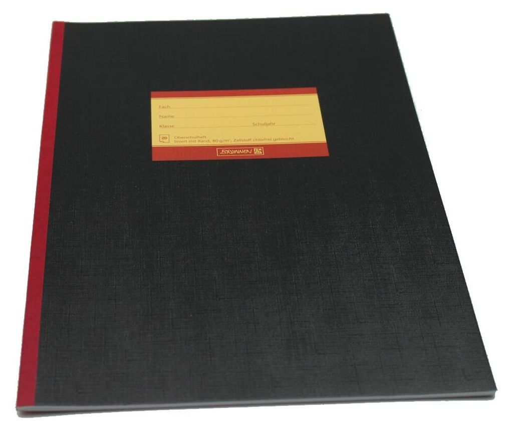 A black notebook with a red spine and a yellow label on the front cover.
