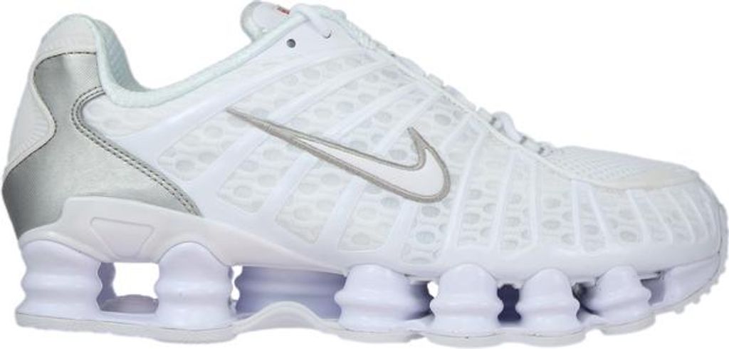 A white Nike Shox TL sneaker with silver accents.
