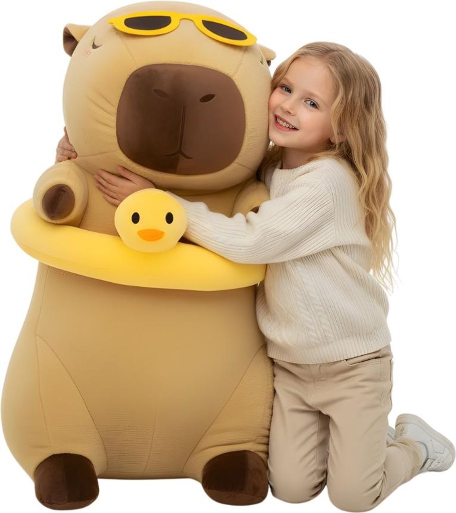 A young girl hugging a large capybara plush toy.