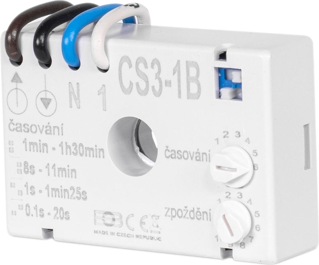 A white electrical timer relay device with wires connected.