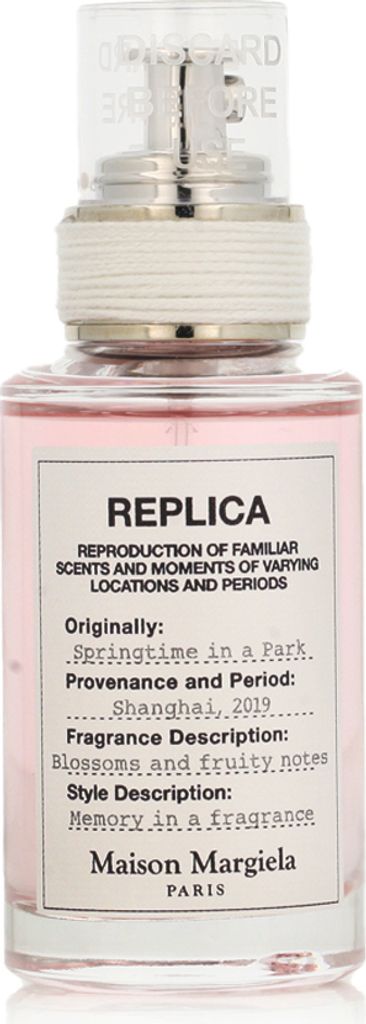 A bottle of Maison Margiela Replica perfume.