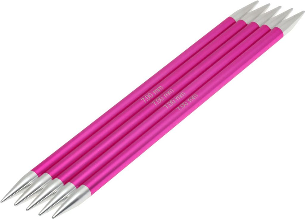 A set of five knitting needles on a white background.