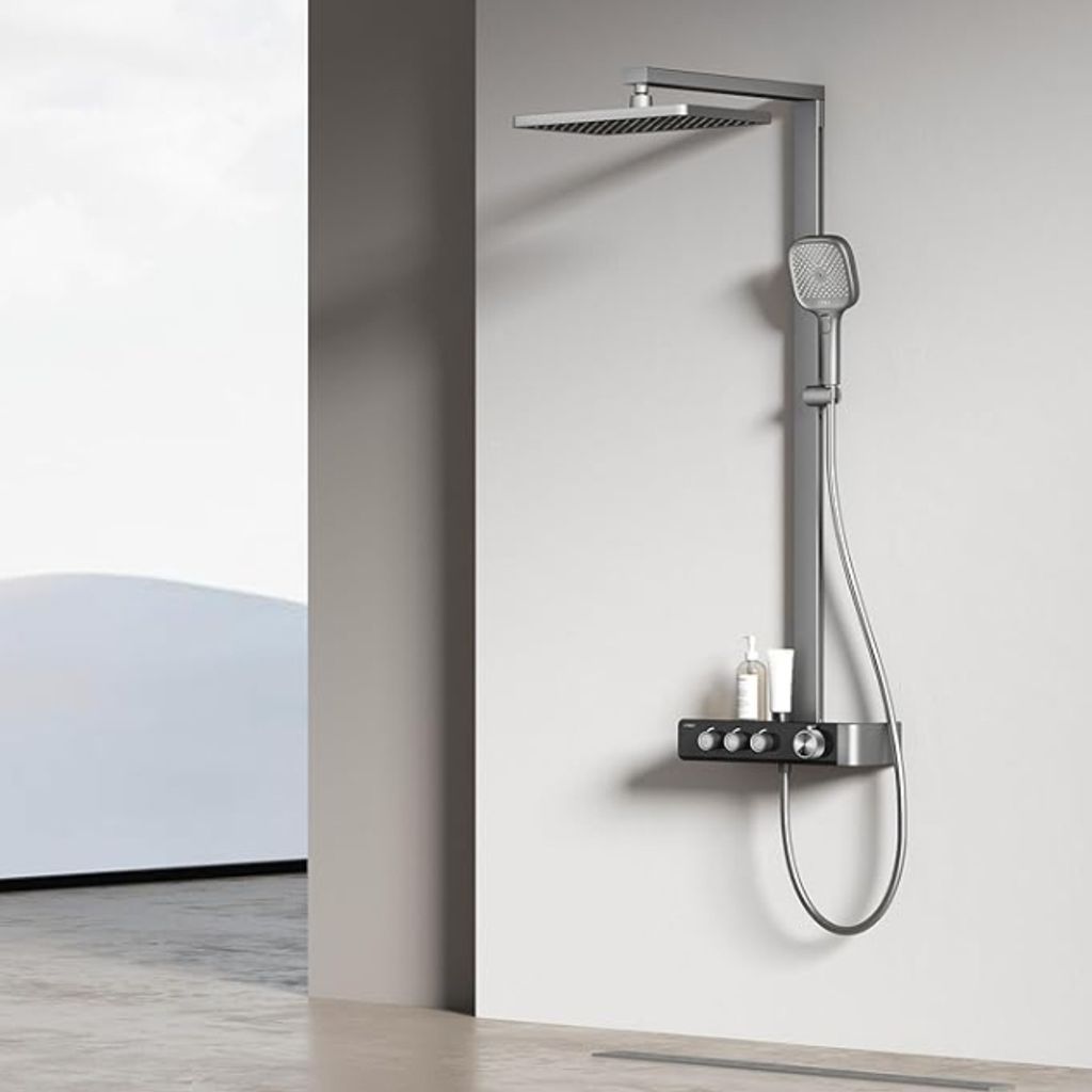 A modern bathroom shower system mounted on a light gray wall, with a minimalist background.
