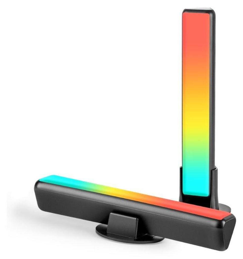 Two LED light bars with a gradient of colors, one standing vertically and the other lying horizontally on a black stand.