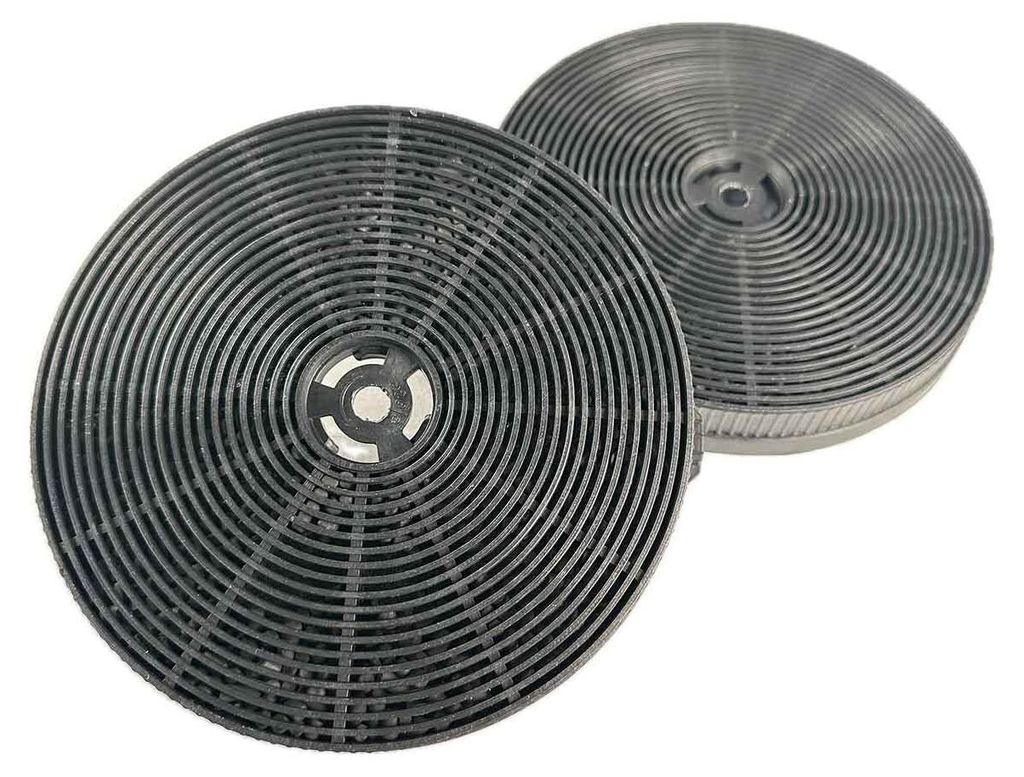 Two charcoal filters for a range hood or similar appliance.
