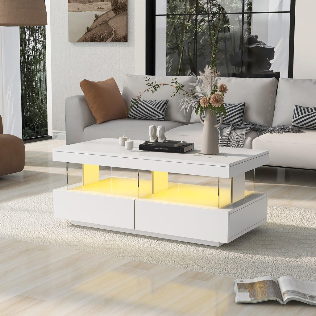 A modern living room scene featuring a white coffee table with LED lighting.