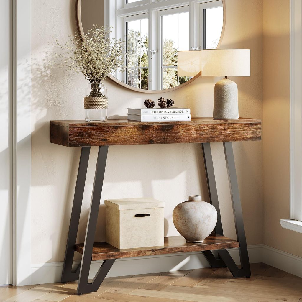 A console table with decorative items in a room.