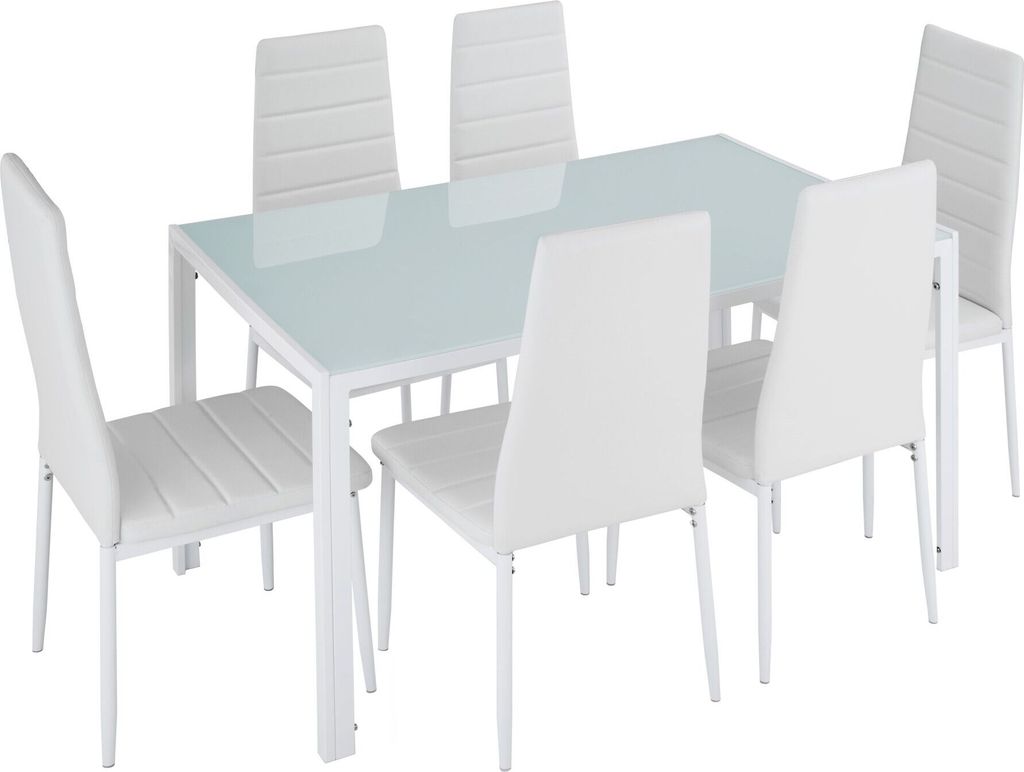 A white dining table with six white chairs.