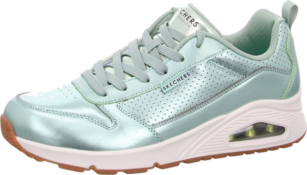 A single green sneaker is shown from the side against a white background.