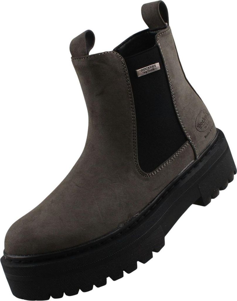 Auf dem Bild ist ein grauer Stiefel abgebildet der von der Seite betrachtet wird. Der Stiefel hat einen robusten Look mit einem hohen Schaft und einer auffälligen Schnürung.