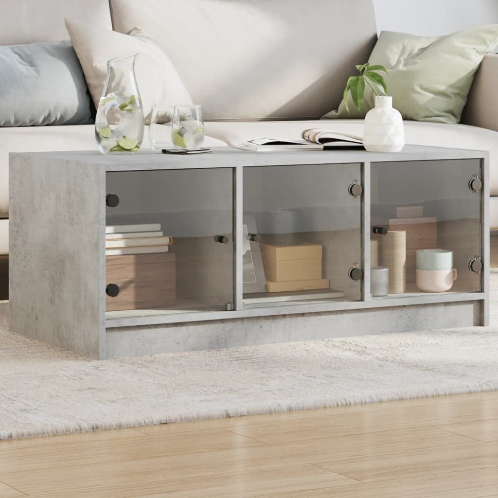 Maison Exclusive - Couchtisch mit Glastüren Betongrau 102x50x42 cm