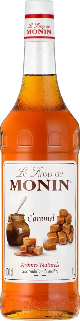 A bottle of Monin Caramel syrup against a white background.