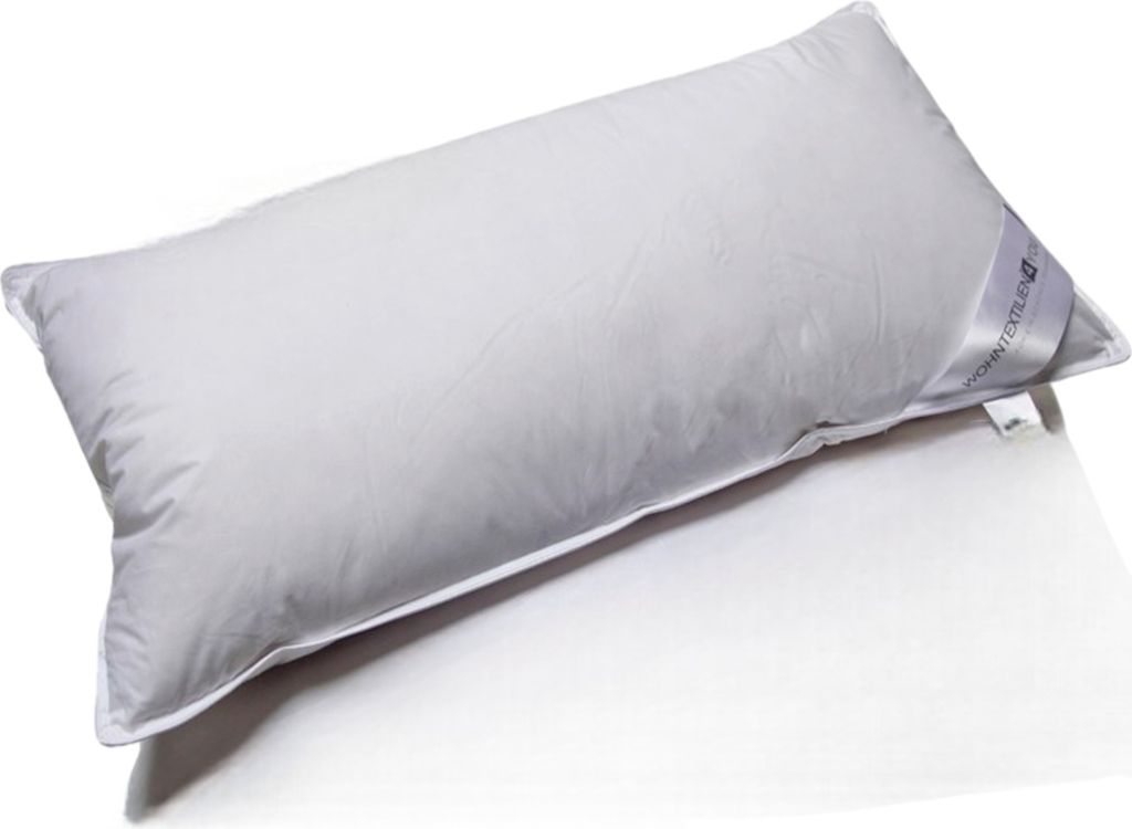 A white pillow is shown on a white surface.