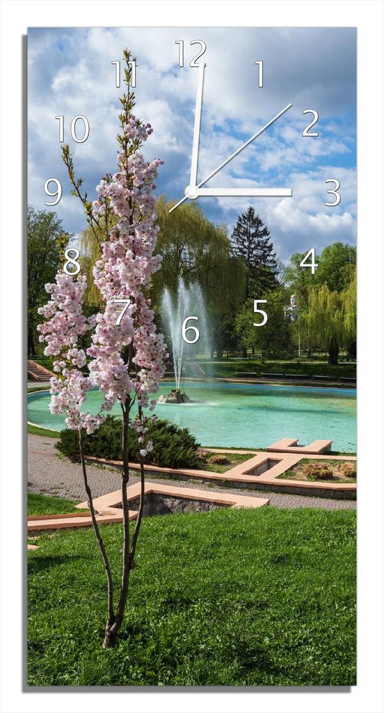 Wallario Design Wanduhr bedruckt, Größe 30 x 60 cm, Motiv: Frühling im Stadtpark