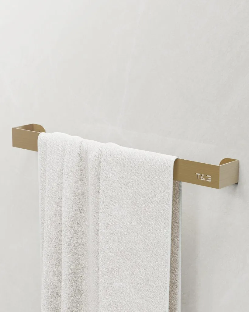 Évitez l'humidité avec le porte serviette Nortiq 51,7 cm alu or brossé