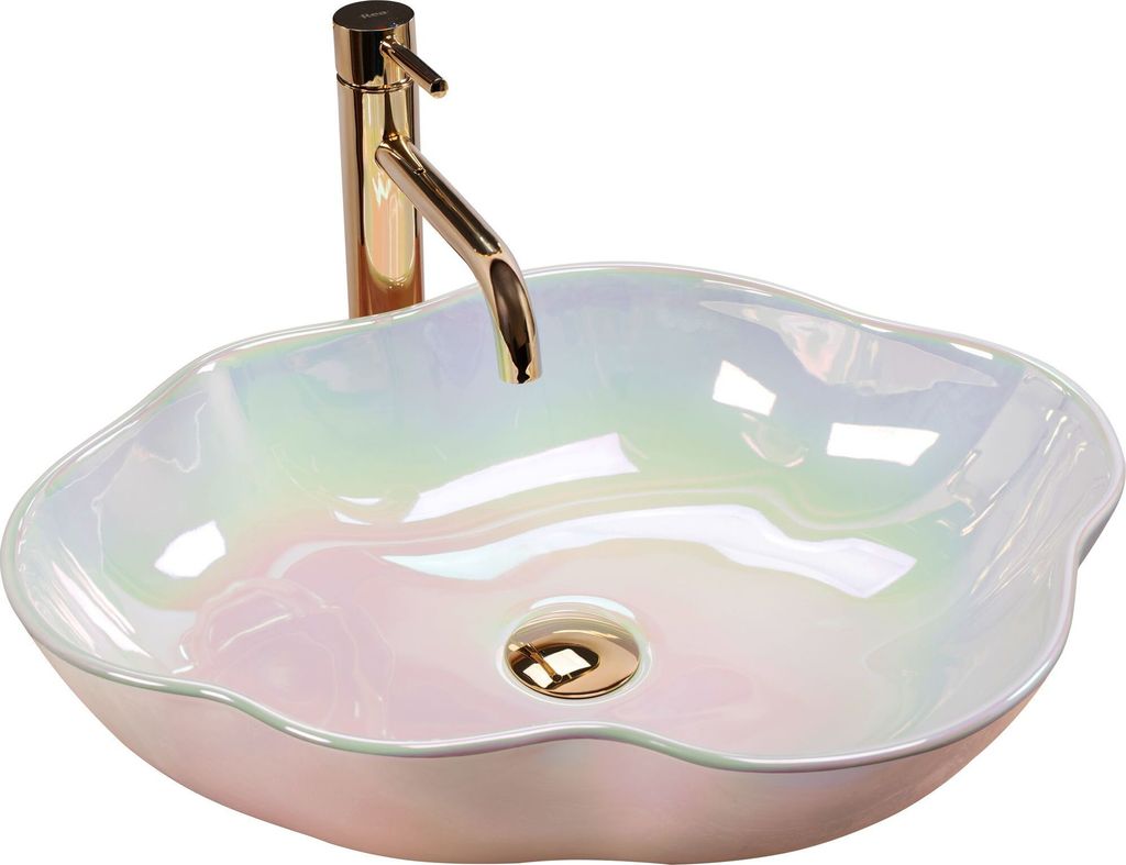 A close-up studio shot of a decorative vessel sink with a faucet.