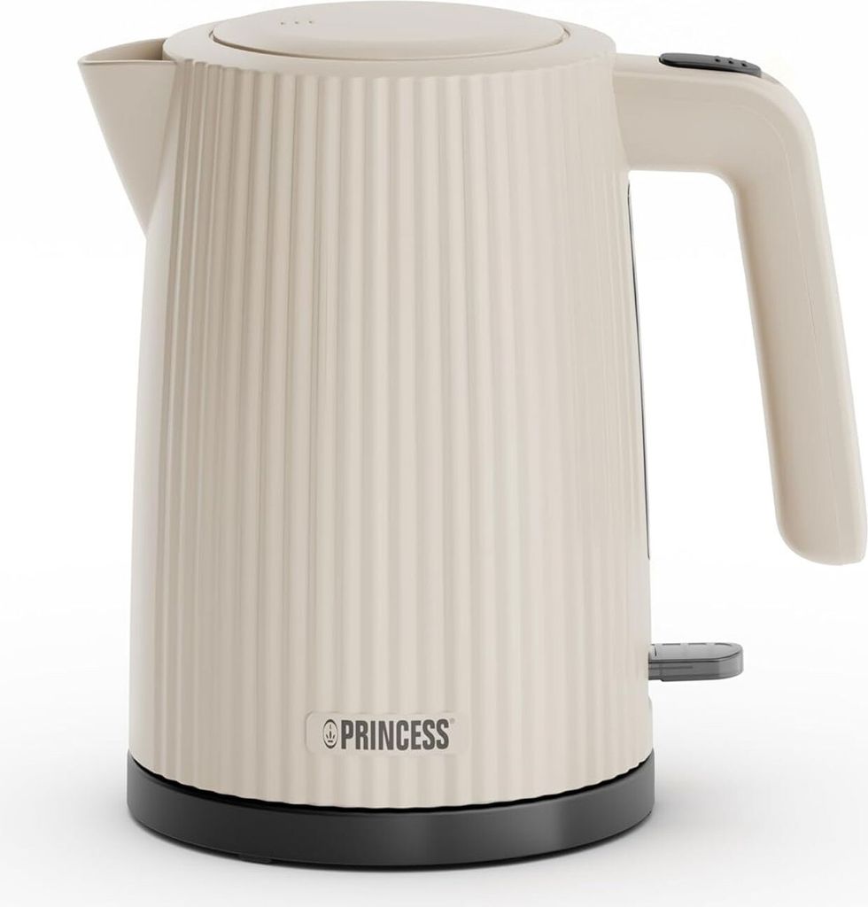 Studio shot of a beige electric kettle.