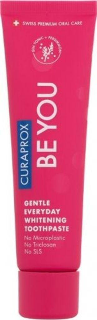 A pink tube of Curaprox toothpaste against a white background.