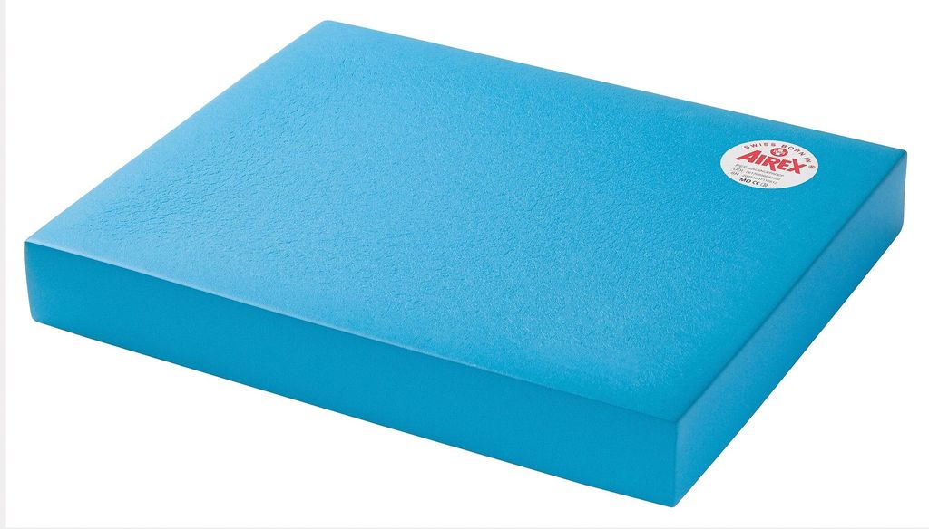 A blue Airex balance pad is shown on a white background.