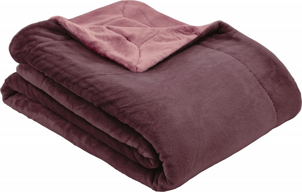 A folded blanket with two different colored sides.