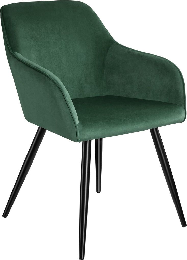 A green velvet armchair with black legs on a white background.