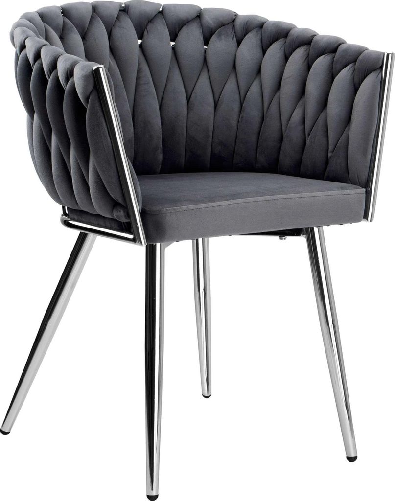A studio shot of a gray velvet chair with chrome legs.