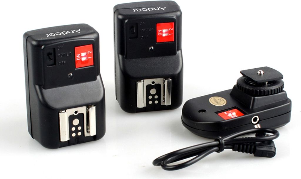 PT-04GY 4 Kanaele Wireless Remote Speedlite-Blitzausloeser Universal- mit 1 Sender & 2 Empfaenger fuer Canon Nikon Pentax Olympus