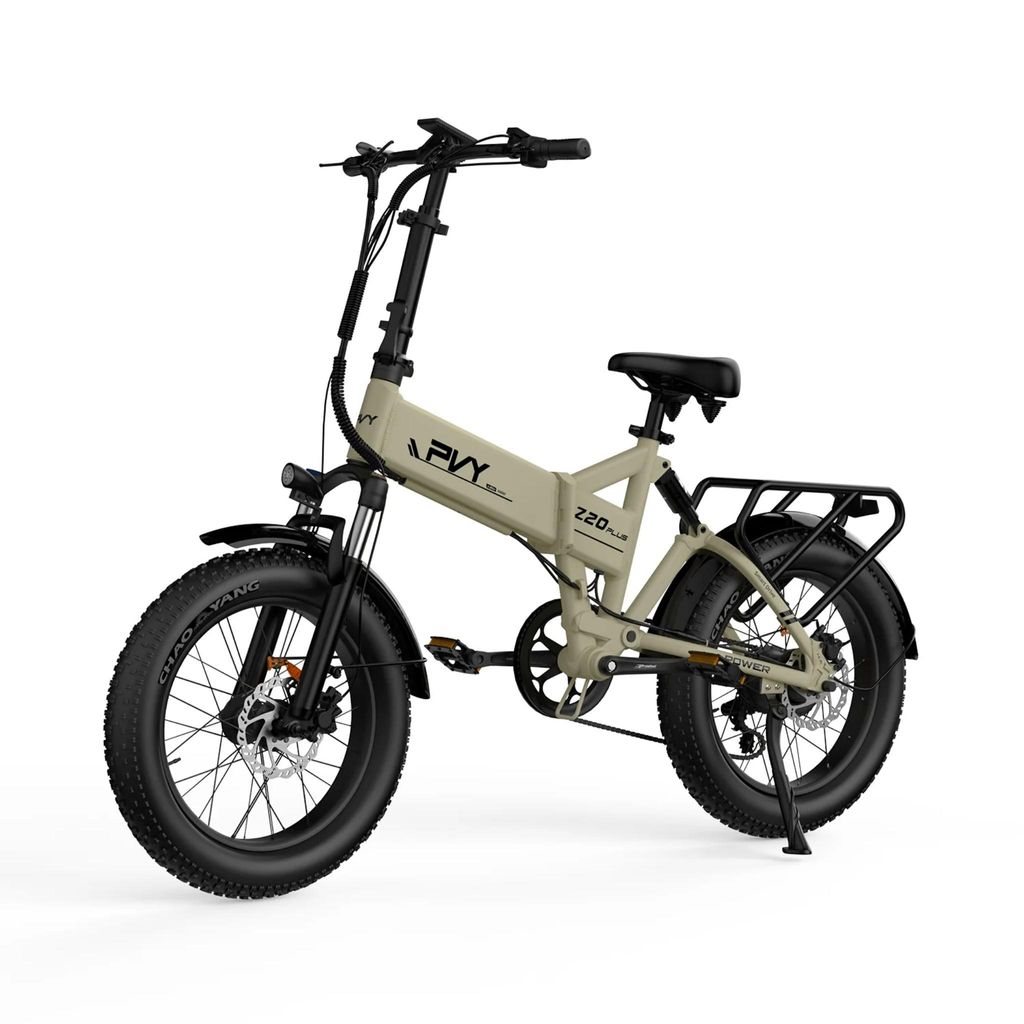 A studio shot of a beige electric bicycle against a white background.