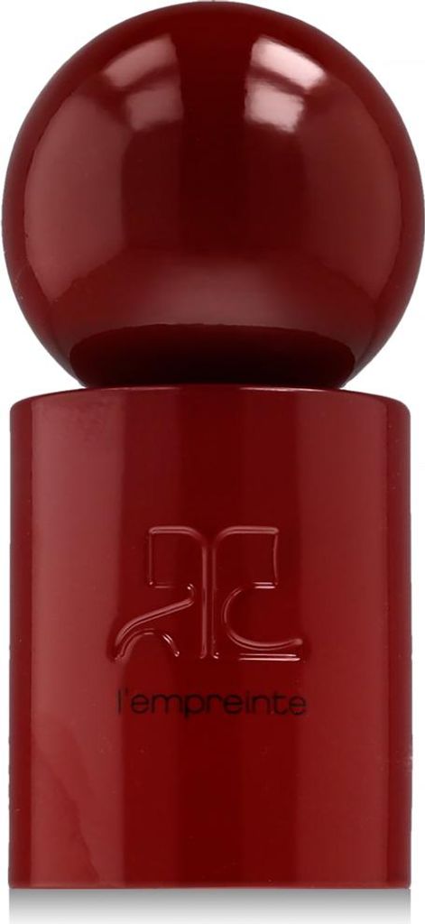 A close-up studio shot of a red perfume bottle.