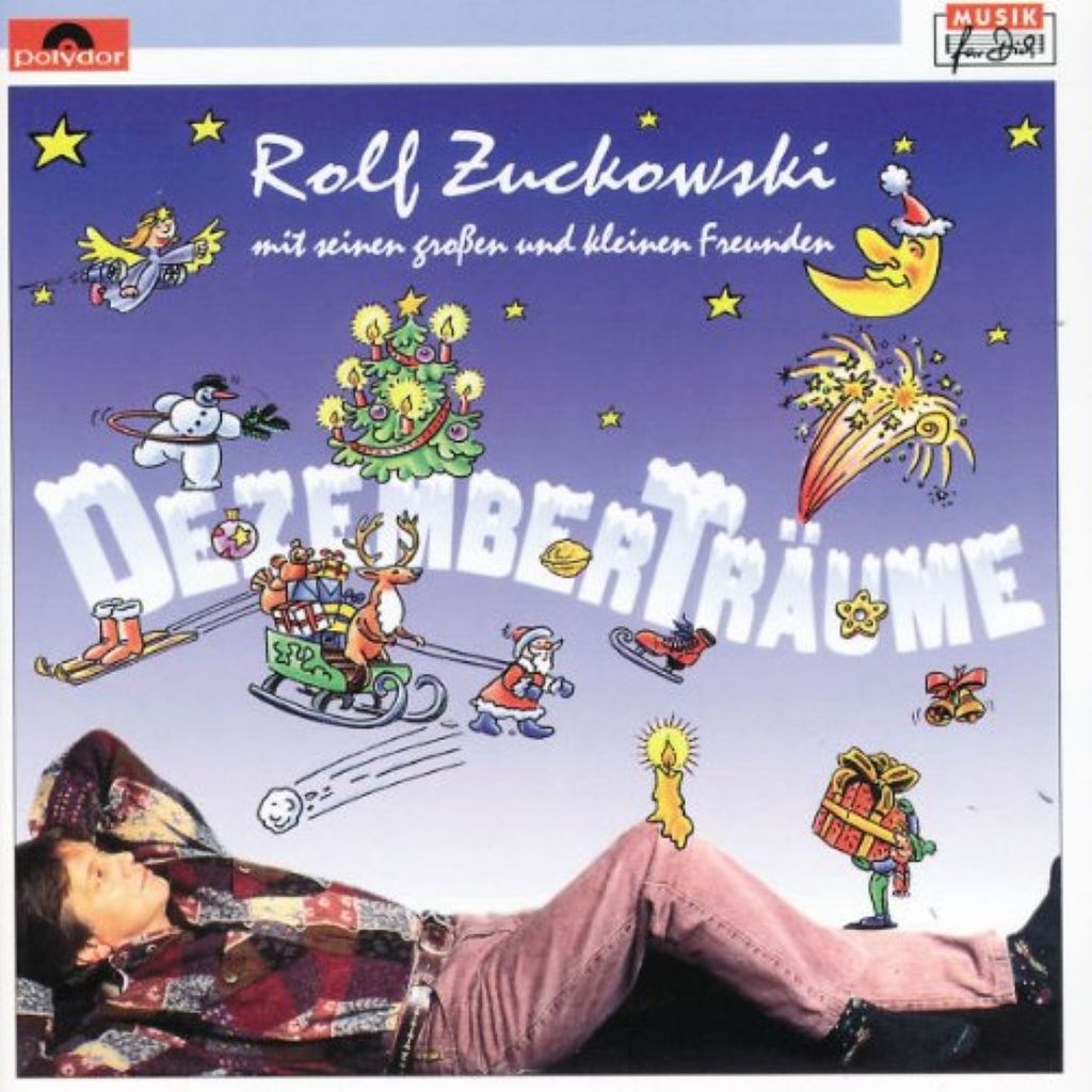 An illustration of a man lying down, dreaming of Christmas and winter scenes, with the album title "Dezemberträume" prominently displayed.