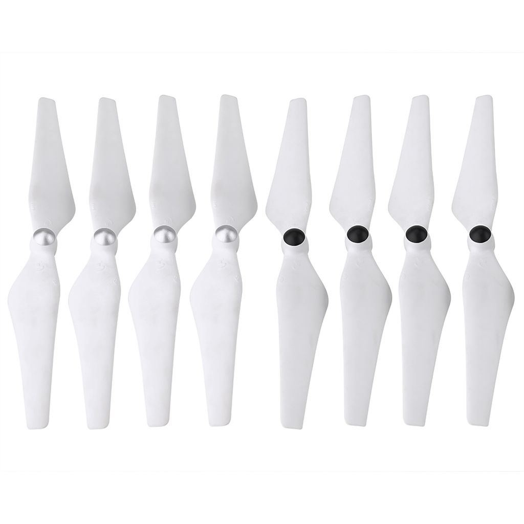 A set of eight white drone propellers arranged in a line against a white background.