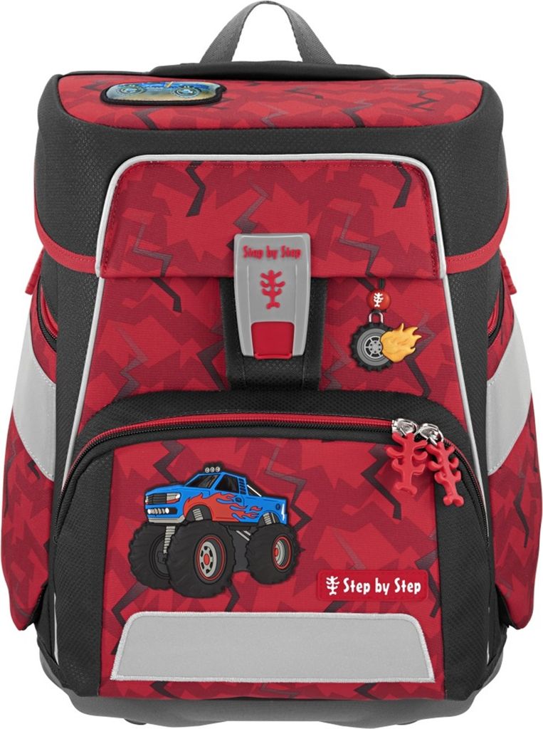 A red and black children's backpack with a monster truck design.