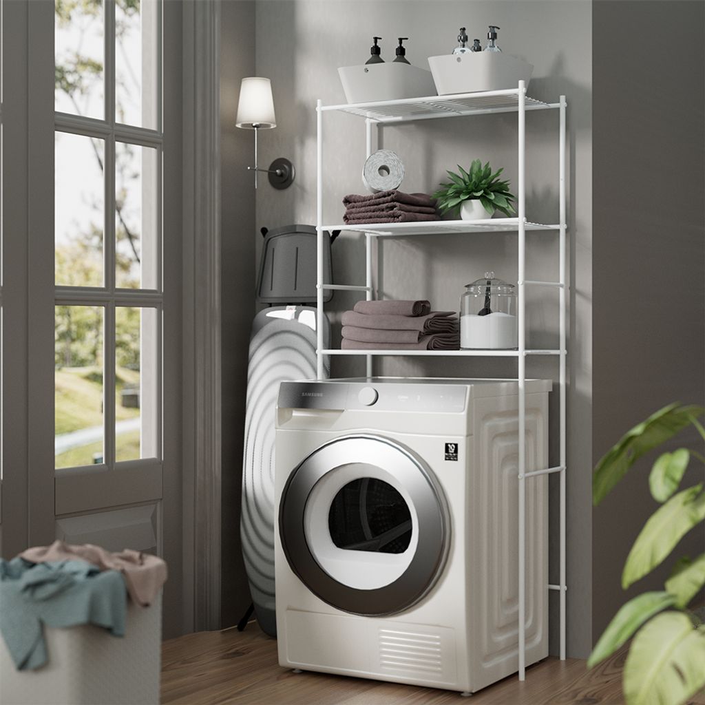 A laundry room scene with a washing machine, dryer, ironing board, and a shelving unit for laundry supplies.