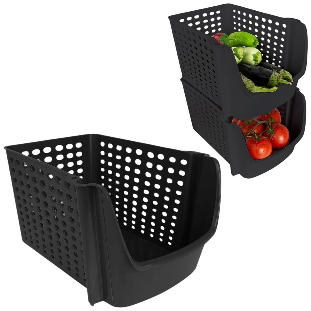Two black stacking storage baskets, one empty and one filled with vegetables.