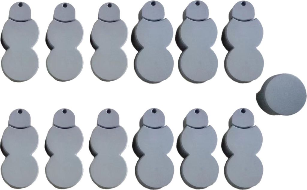 A collection of snowman-shaped objects arranged in two rows, with one additional object to the right.
