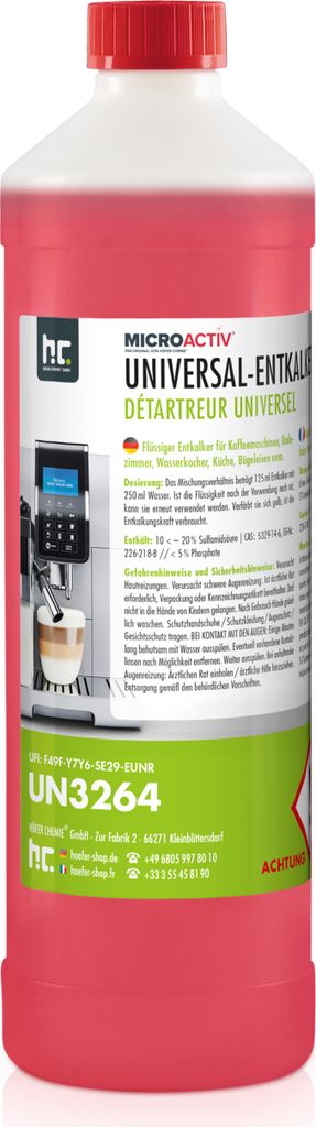 A bottle of red liquid with a label showing a coffee machine.