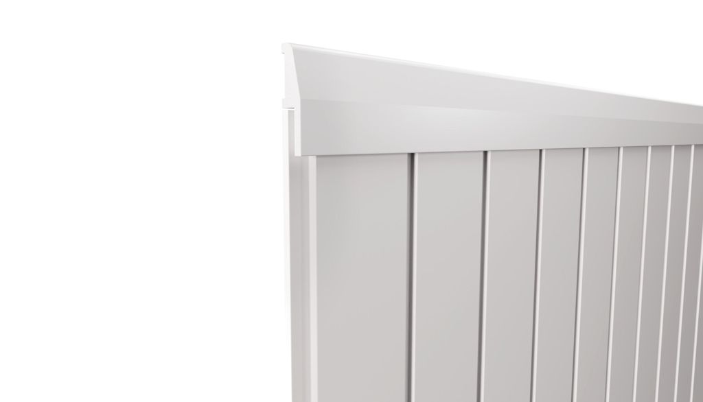 A close-up view of the top edge of a white wall panel trim.